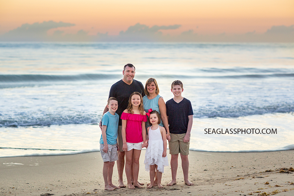 Family smiles all together for a great family picture during a family photoshoot in Vero Beach Florida