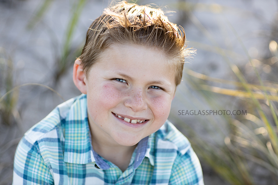 Close up of a young man during a family photoshoot in Vero Beach Florida