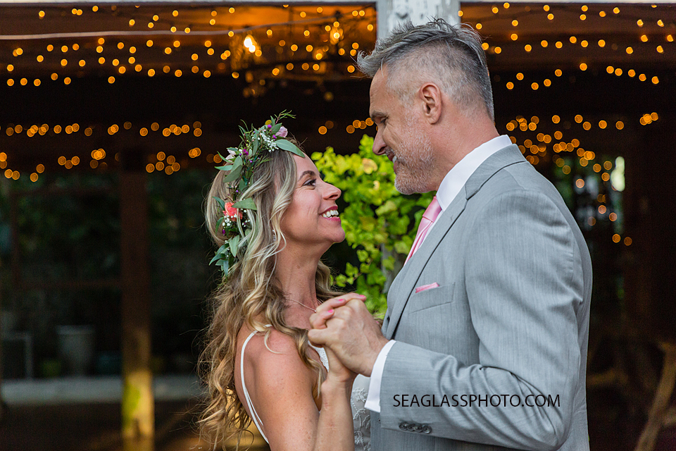Bride and Groom dancing together at their wedding reception in Vero Beach Florida