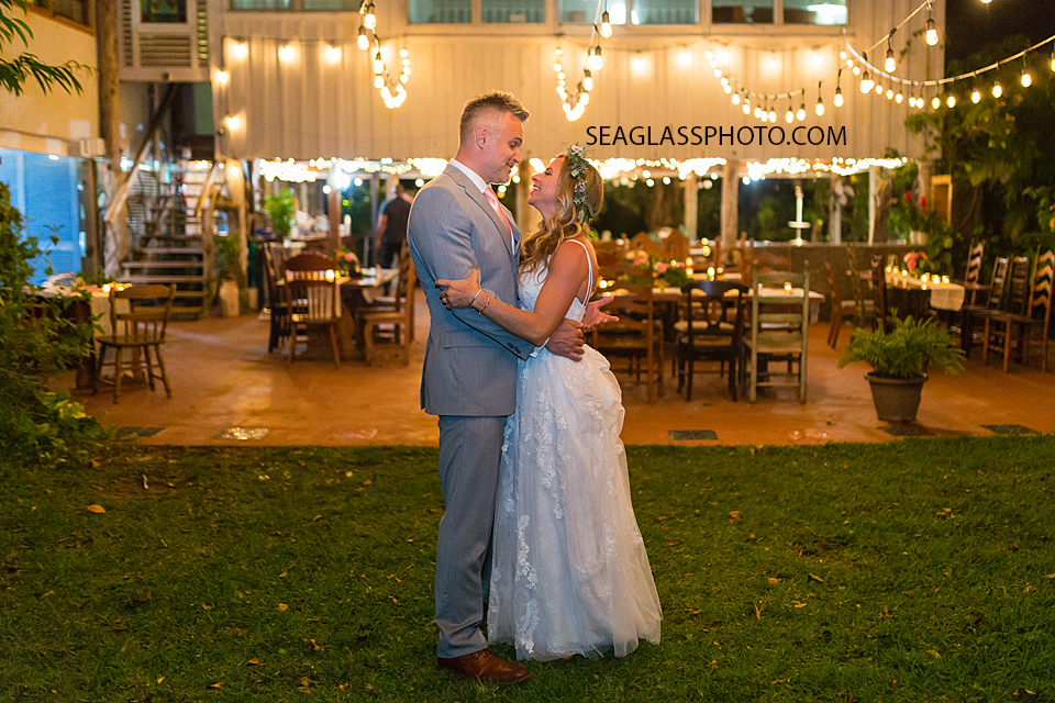 Bride and Groom holding each other close after their wedding reception in Vero Beach Florida