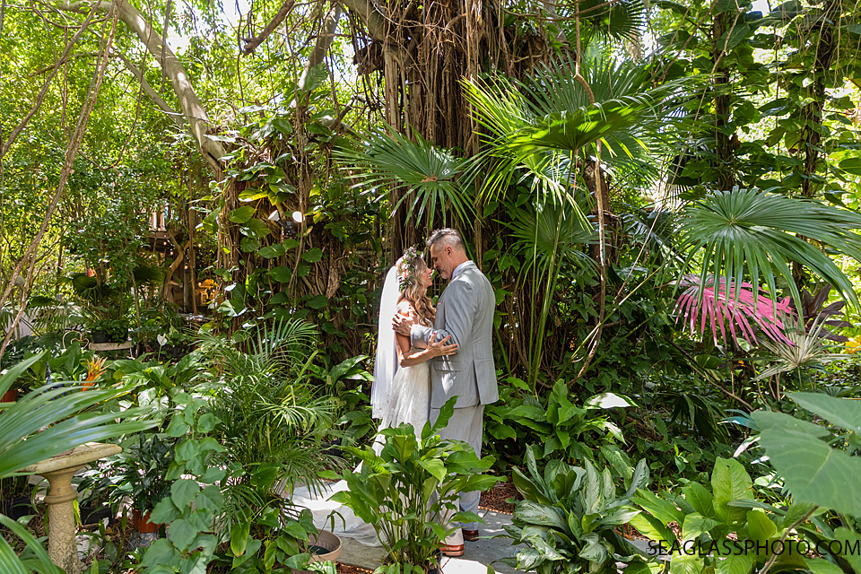 Bride and Groom amidst a beautiful garden in Vero Beach Florida