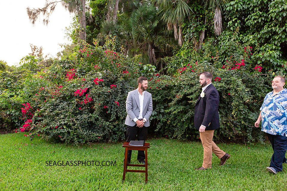 Groom walking up to the officiant before his wedding begins in Vero Beach Florida