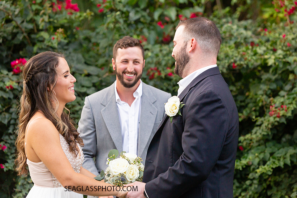 Bride and Groom smiling and laughing together during their wedding in Vero Beach Florida