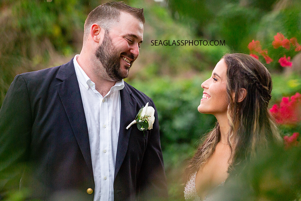Bride and Groom smiling at each other following their wedding in Vero Beach Florida