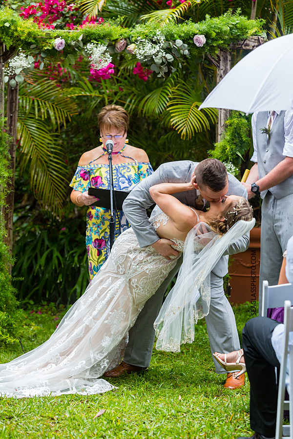 The groom kisses his Bride for the first time as husband and wife in Vero Beach Florida