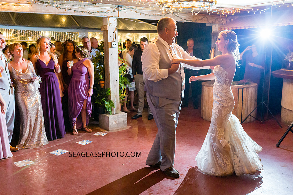 Bride dances with her father during the wedding reception in Vero Beach Florida