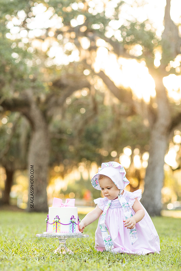 Cute girl with her birthday cake in Riverside Park in Vero Beach Florida
