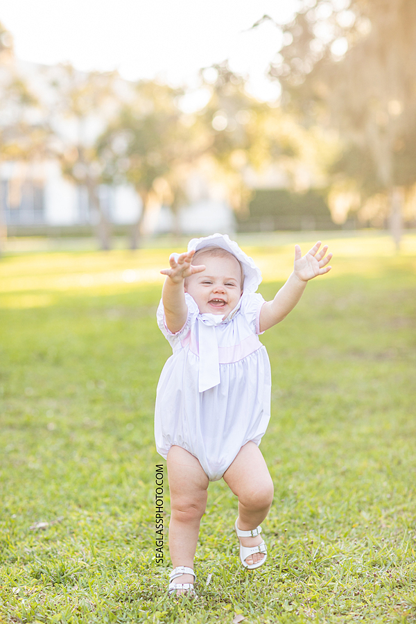 Happy Baby Walking and Laughing in Riverside Park in Vero Beach Florida