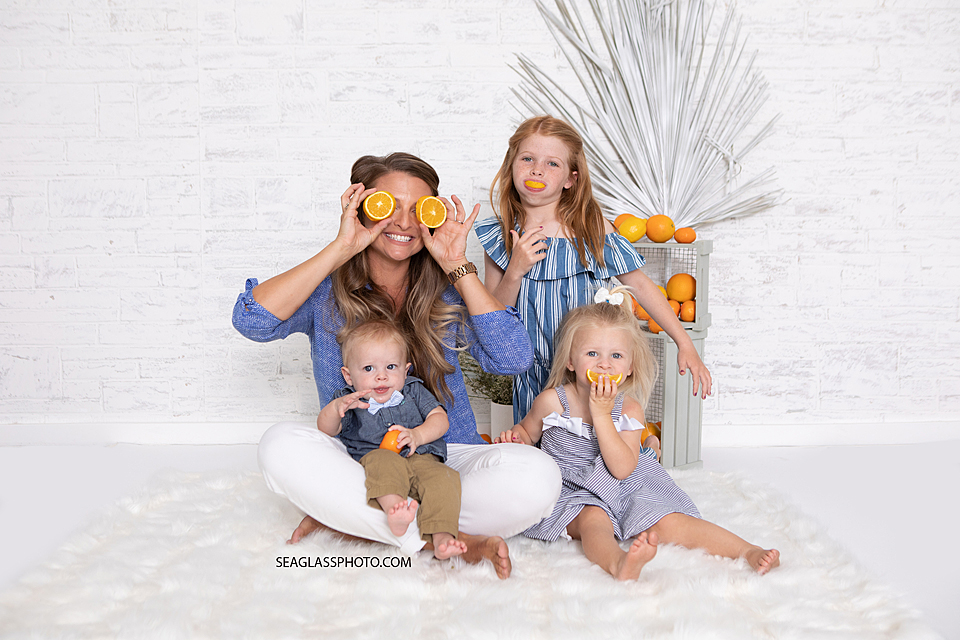 Cute Family Playing with Oranges in Vero Beach Florida