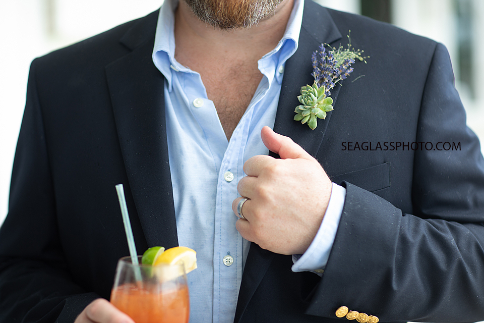 LGBT Groom standing with a cocktail in Vero Beach Florida