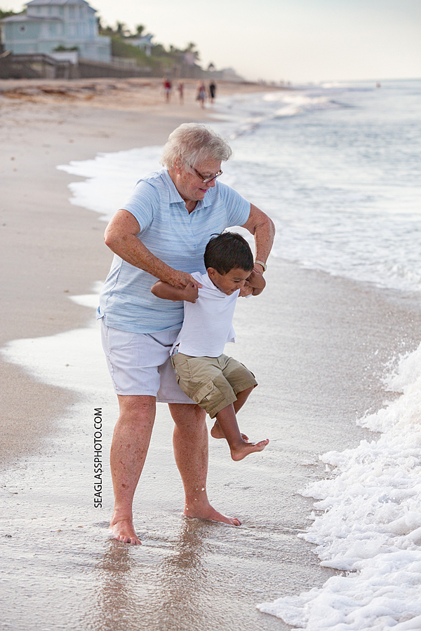 Grandma and her grandson on the beach in Vero Beach Florida