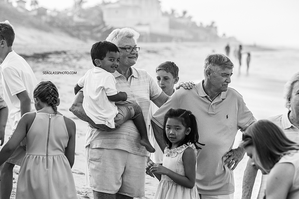 Black and White Family together on the beach in Vero Beach Florida
