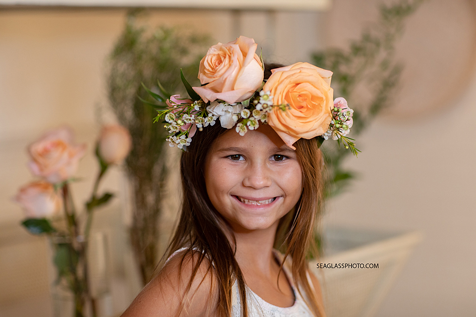 Girl smiling with her flower crown in Vero Beach Florida