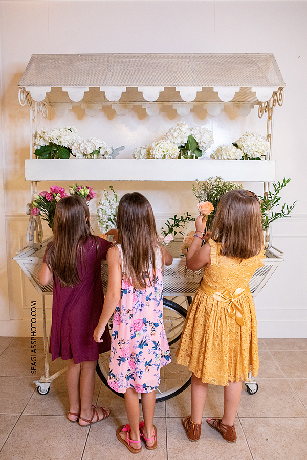 Little girls with flowers in Vero Beach Florida