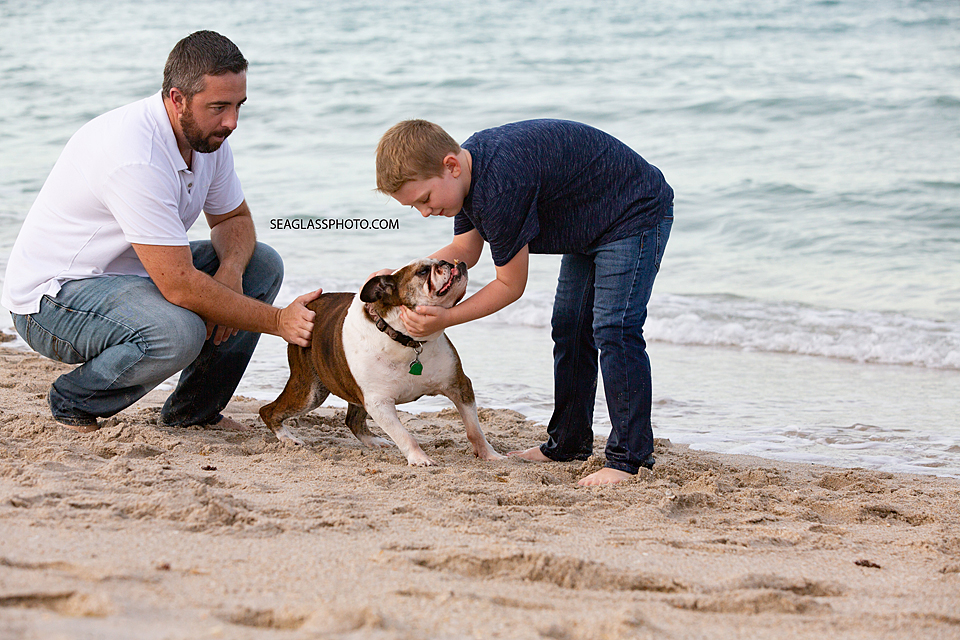 Father son and their dog in Vero Beach Florida