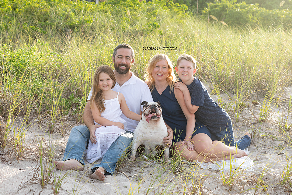 Family on the beach with their dog in Vero Beach Florida