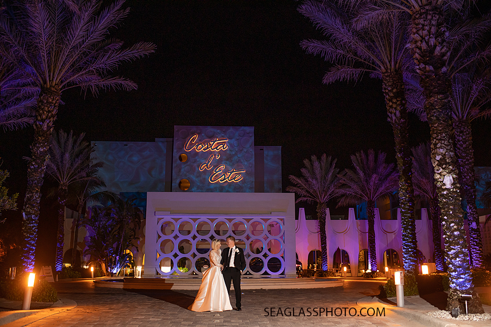 night shot of couple standing in front of hotel Vero Beach CostadEste-Disney-Family-Vero-Beach-Photographer-Windsor-Seaglass