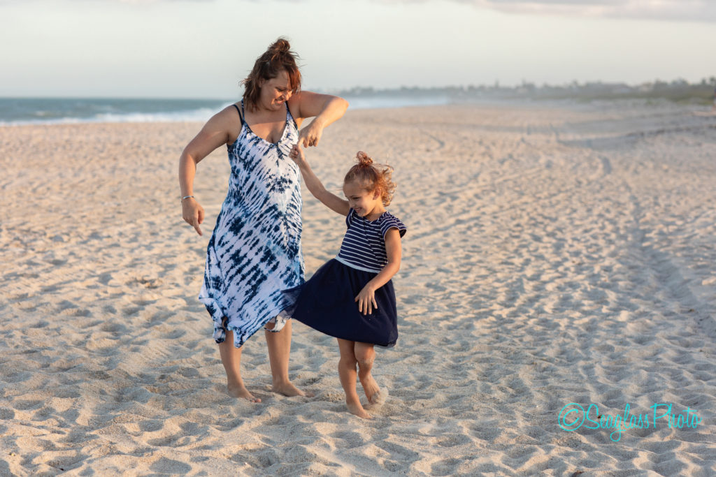 mother dancing with daughter on the beach Vero Beach Florida Newborn Photographer