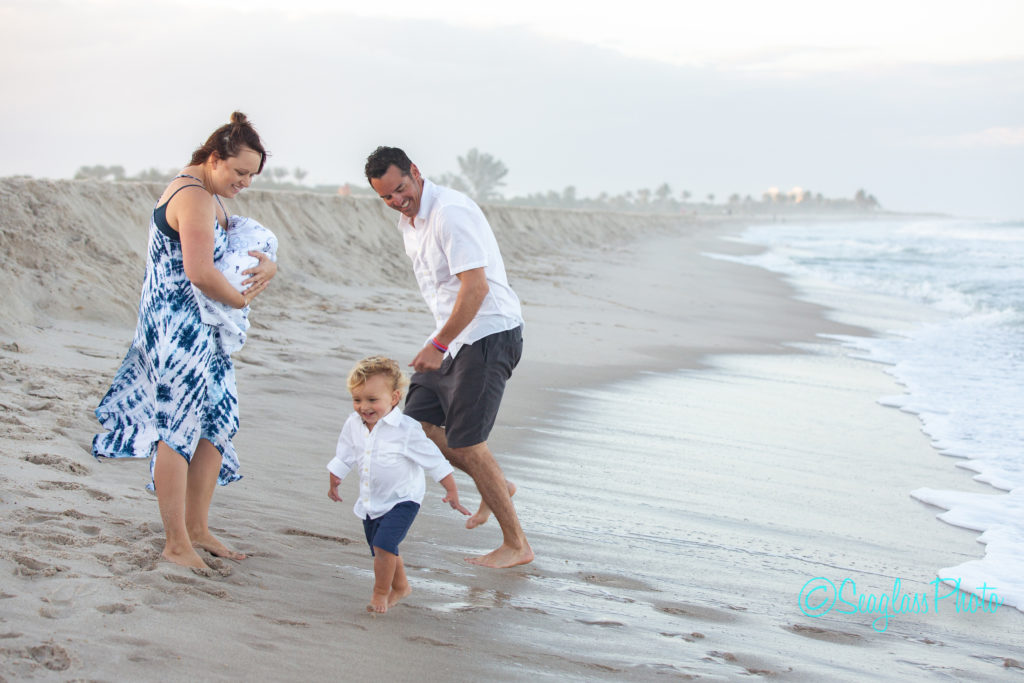 family playing on the beach newborn Vero Beach Florida Newborn Photographer