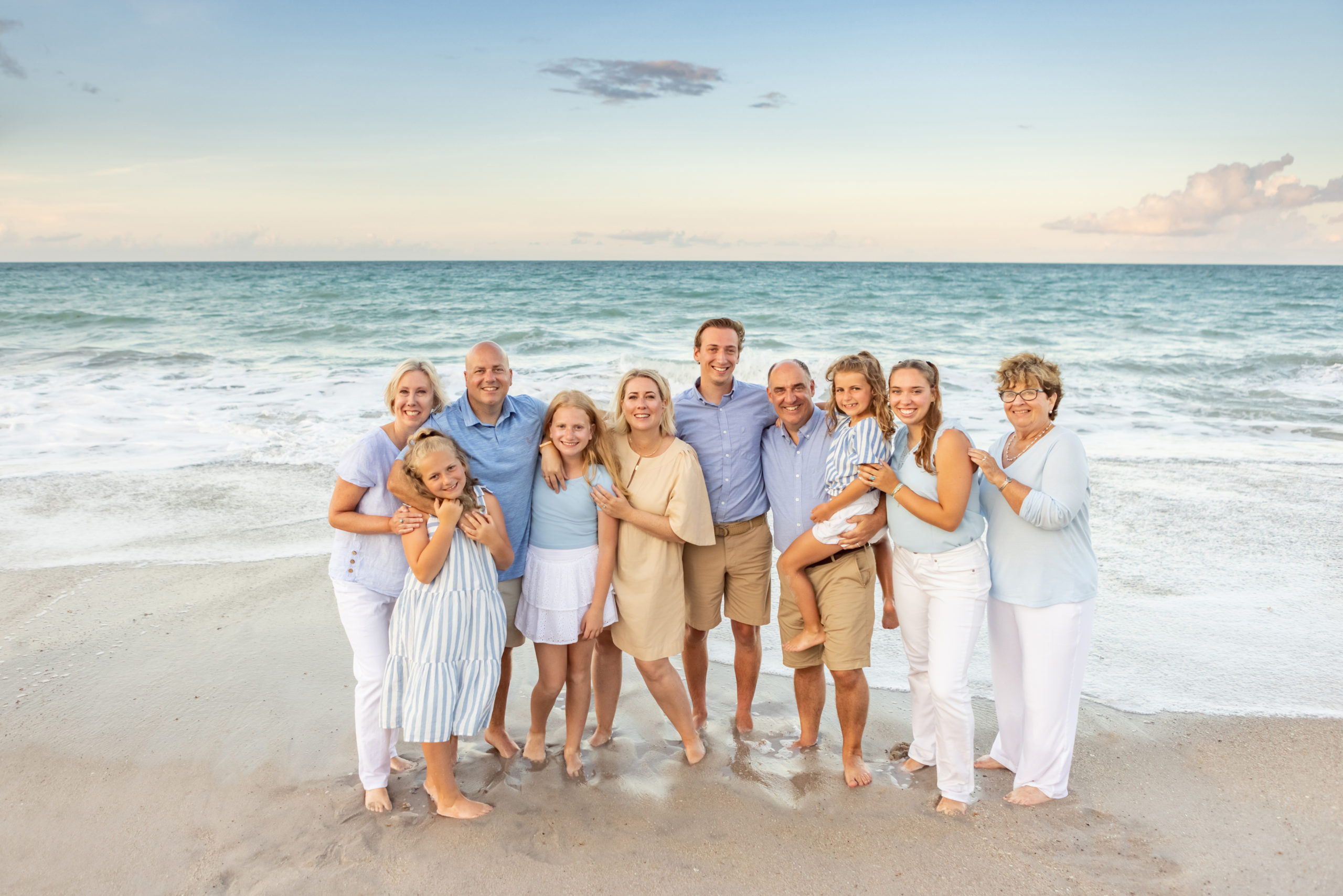 A family portrait with 3 generations at Disney Vero Beach Florida. The sunset was beautiful 