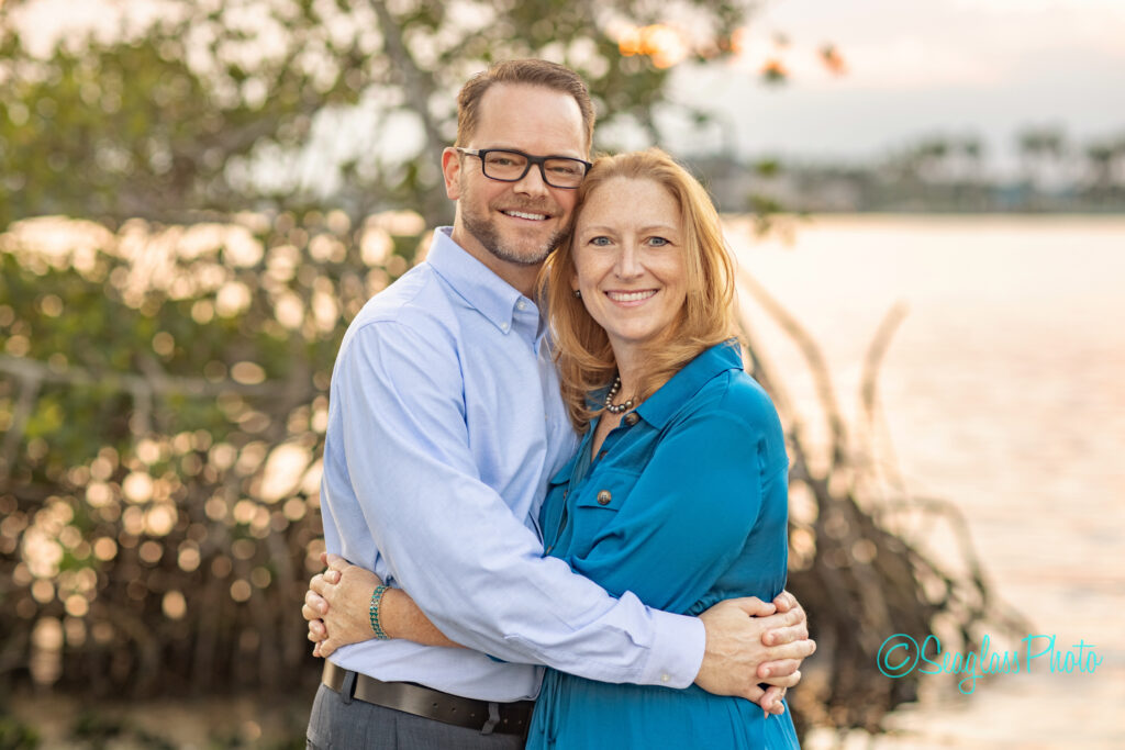 Beautiful sunset portrait of a couple by the river in Vero Beach Florida 