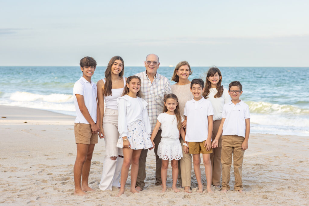 beautiful portrait of grandparents with their grandkids by the ocean in Vero Beach Florida Moorings
