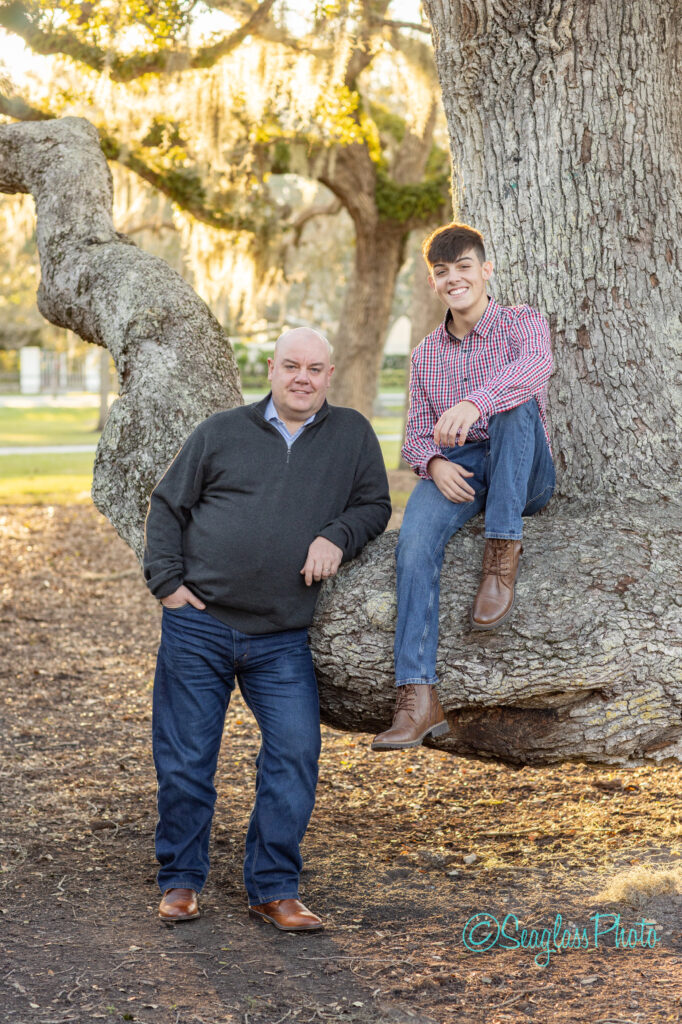 father and son portrait on an old oak tree next to the Vero Beach Museum of Art