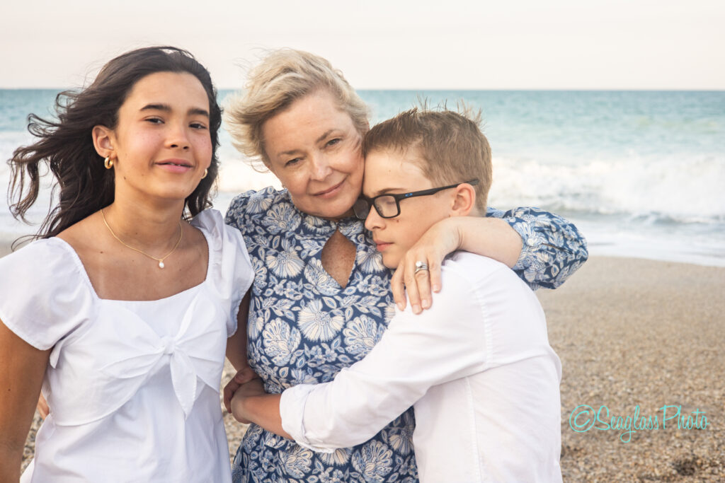 grandmother hugging onto her grandkids Vero Beach Florida 