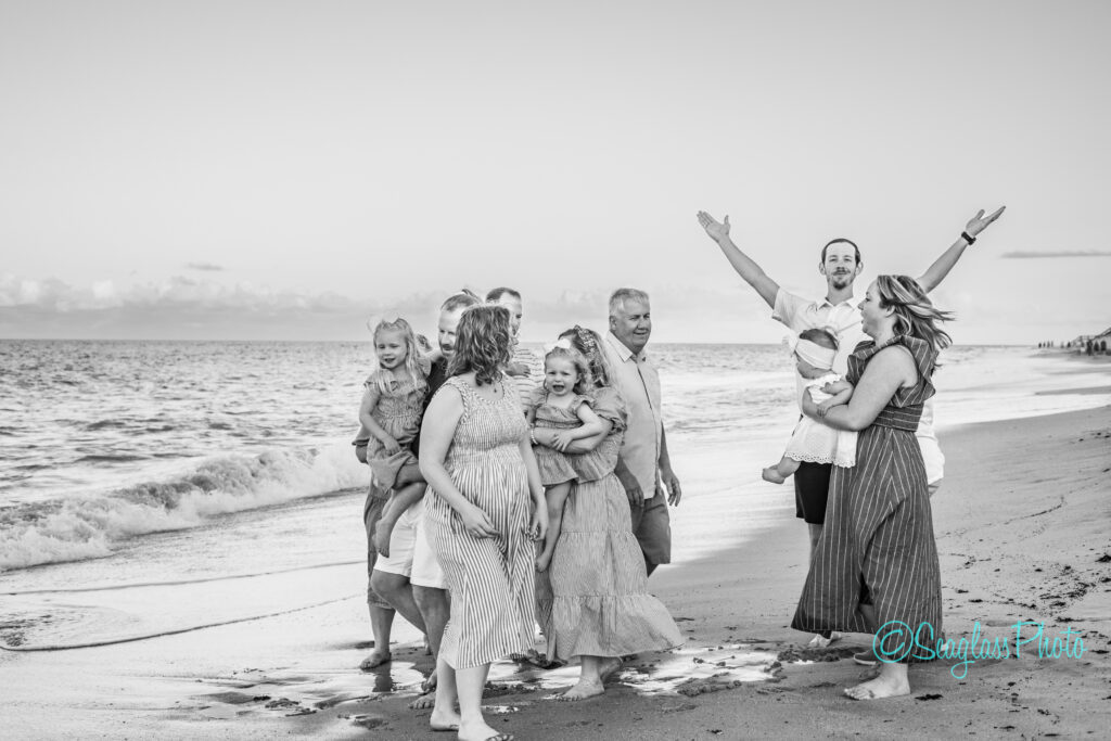 black and white photo of family photoshoot  Disney Vero Beach Resort