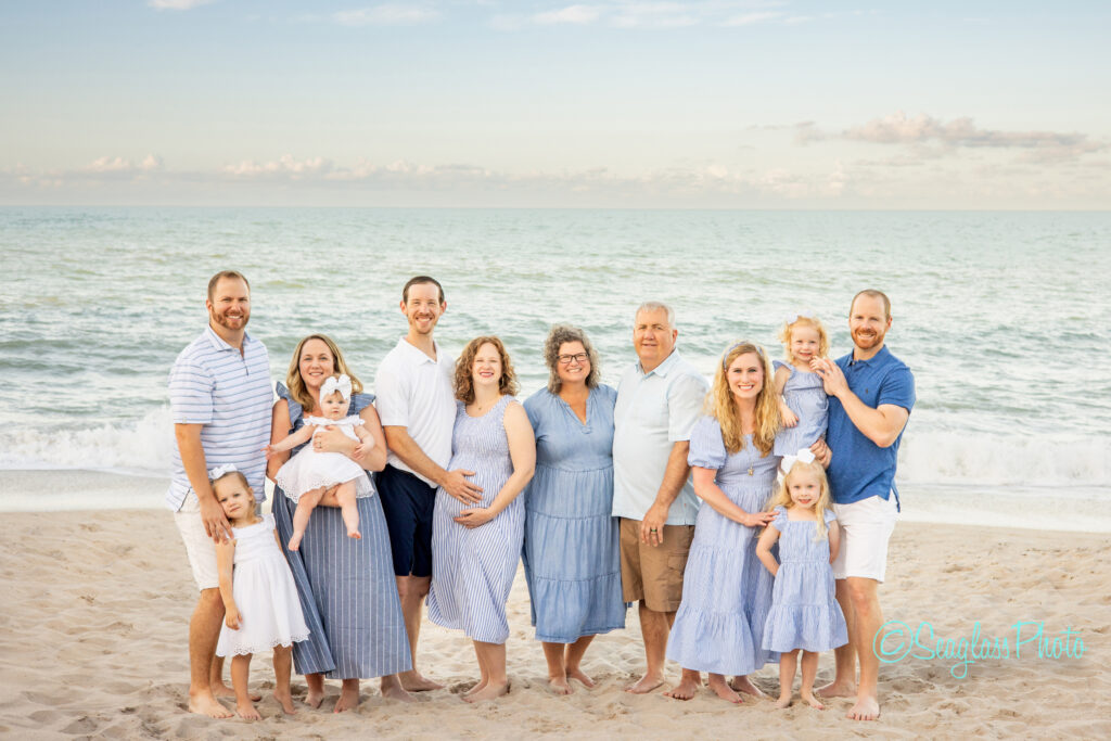 large family photoshoot at the Disney Vero Beach Hotel in Florida at sunset by the ocean 