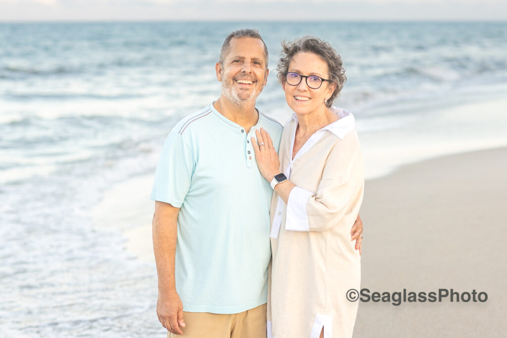 Grandparents on the beach at sunset in Ft. Pierce Florida 